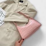 Lora. - Shiny Leather Bag