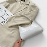 Lora. - Shiny Leather Bag